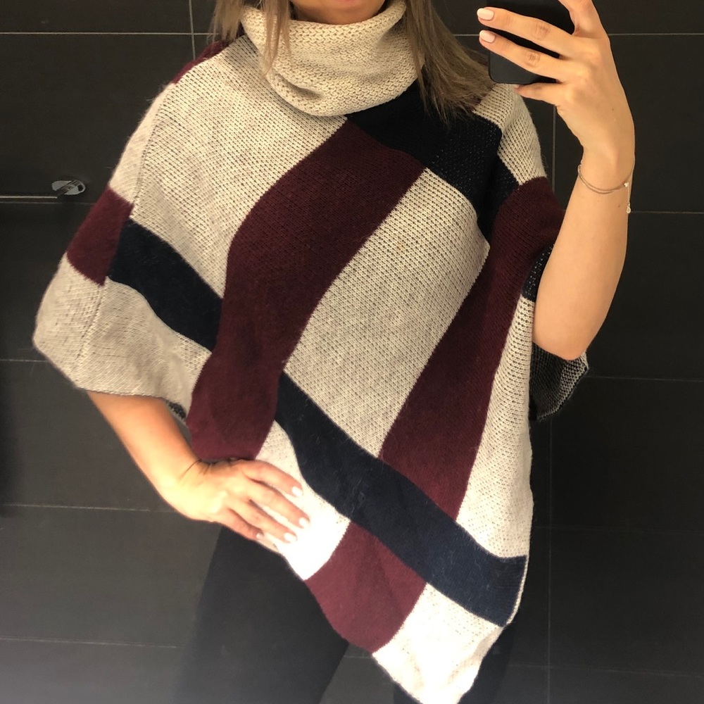 Knitted throw over sweater